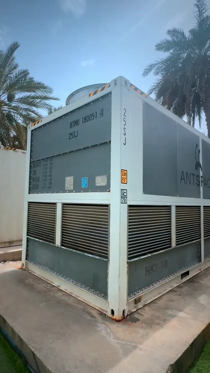 A Bitmain Antspace container cooler at a Segments site
